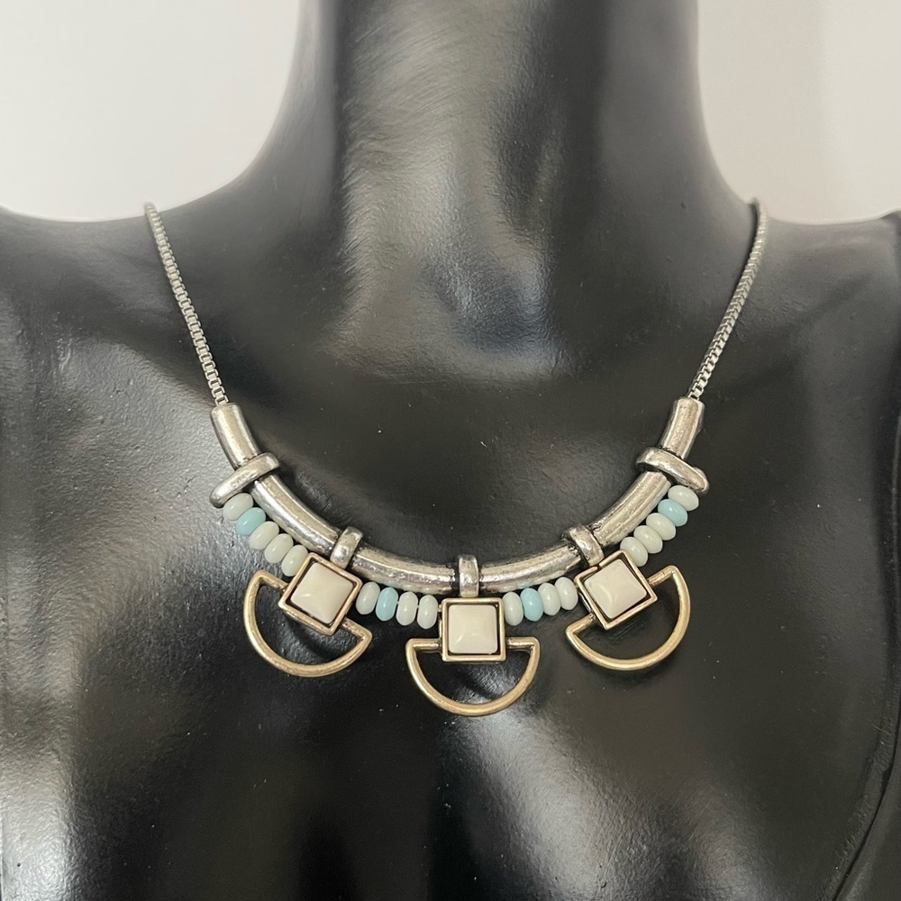 Steels and dot wanderer necklace silver tone